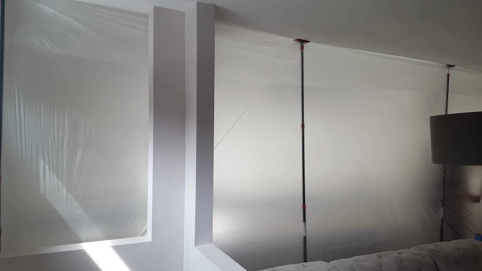 Negative air pressure containment with plastic sheeting