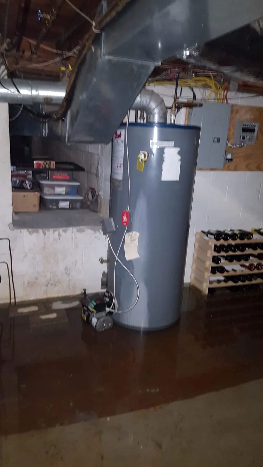 Severely flooded basement with several inches of standing water