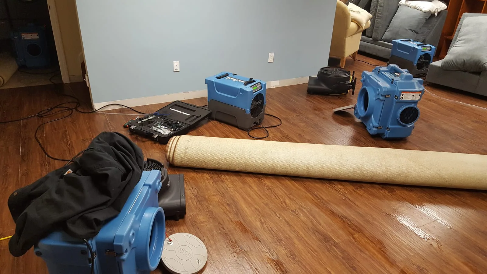 Air movers and dehumidifiers drying Westport home