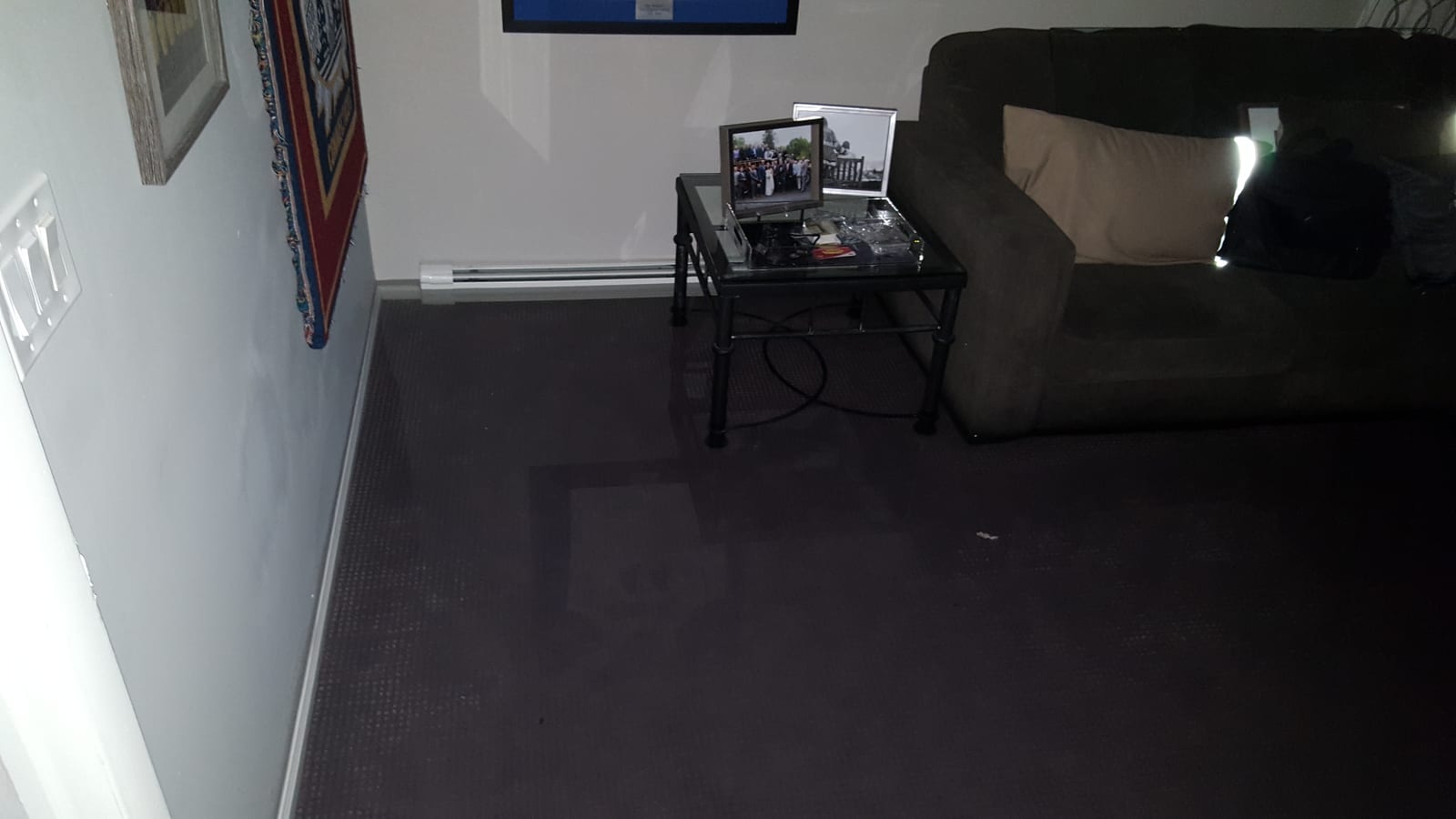 Sewage backup flooded the living-room area of a finished basement in Scarsdale NY
