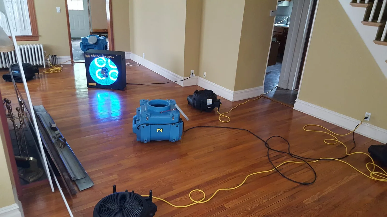 Hydroxyl generator and air movers running to remove musty mold odor after remediation