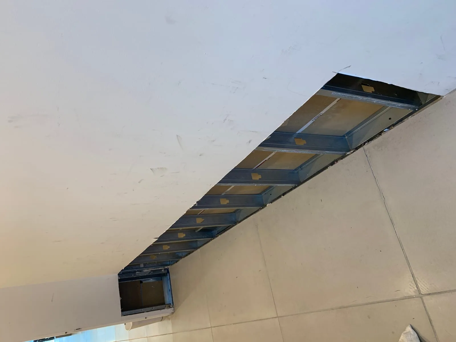 Water-damaged commercial property mid-restoration by 911 Storm in Fairfield County